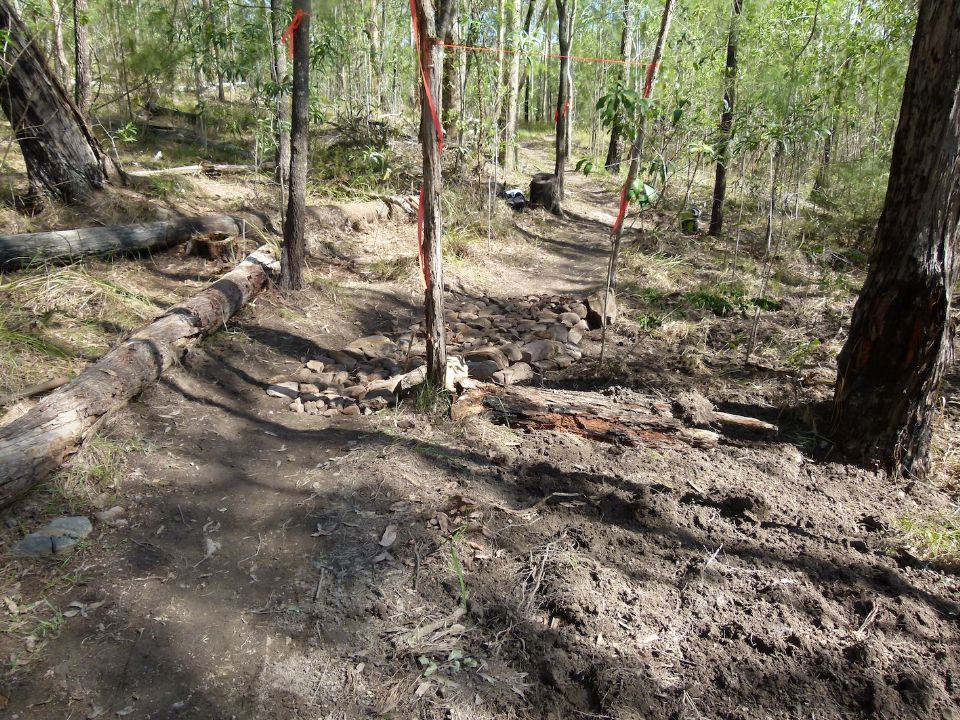 Layers of stone and trailwork warning flags