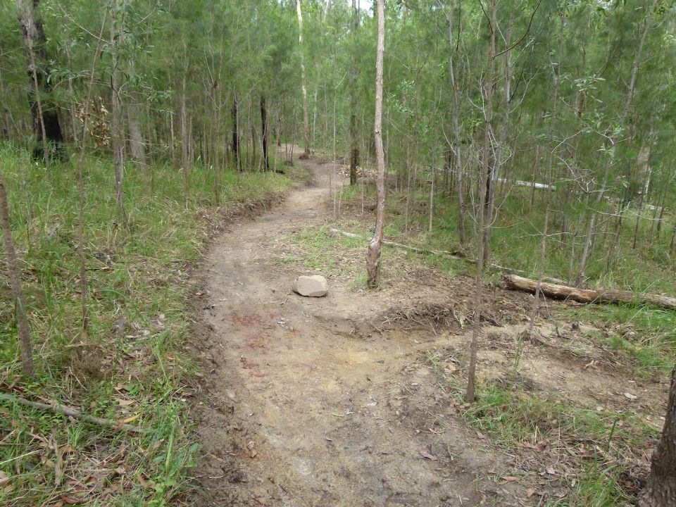 Rolling grade dips to cope with deep, black soil on gentle terrain