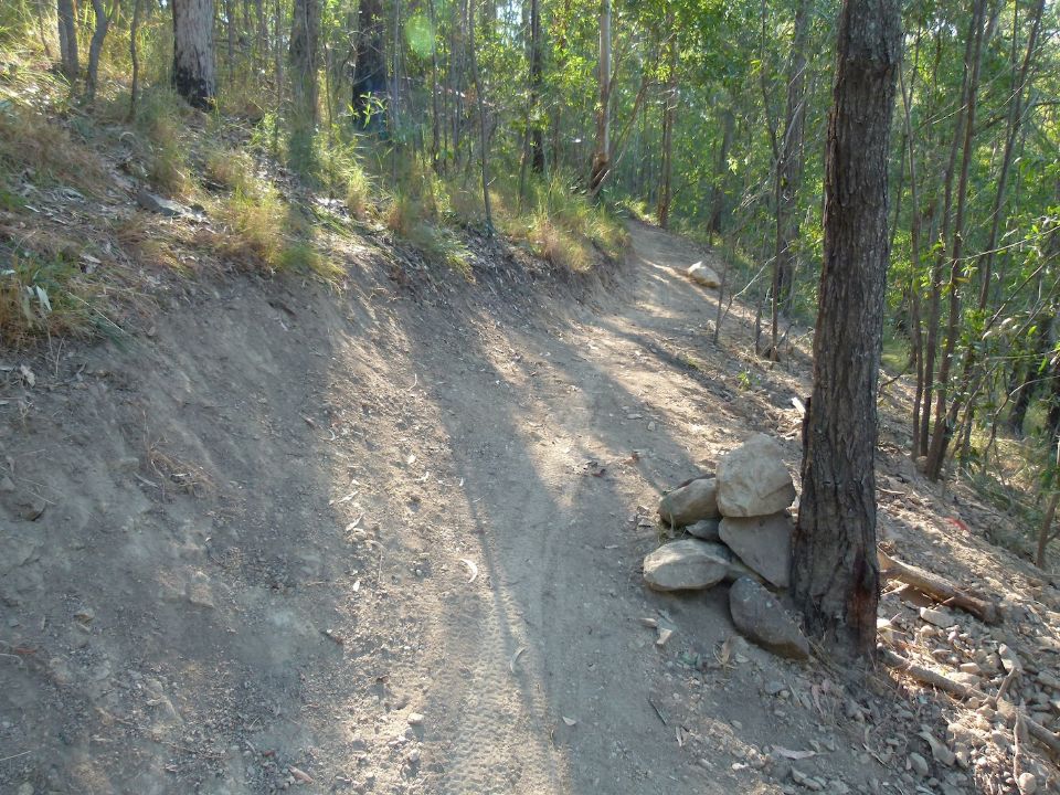 Steep sideslopes requiring serious benching and drainages