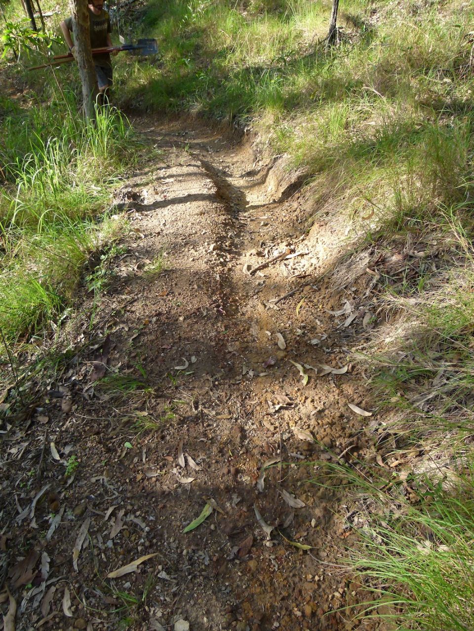 Water being channelled along the trail