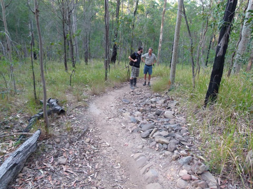 Ashley and Ranger Mark discussing re-routing trail at this site